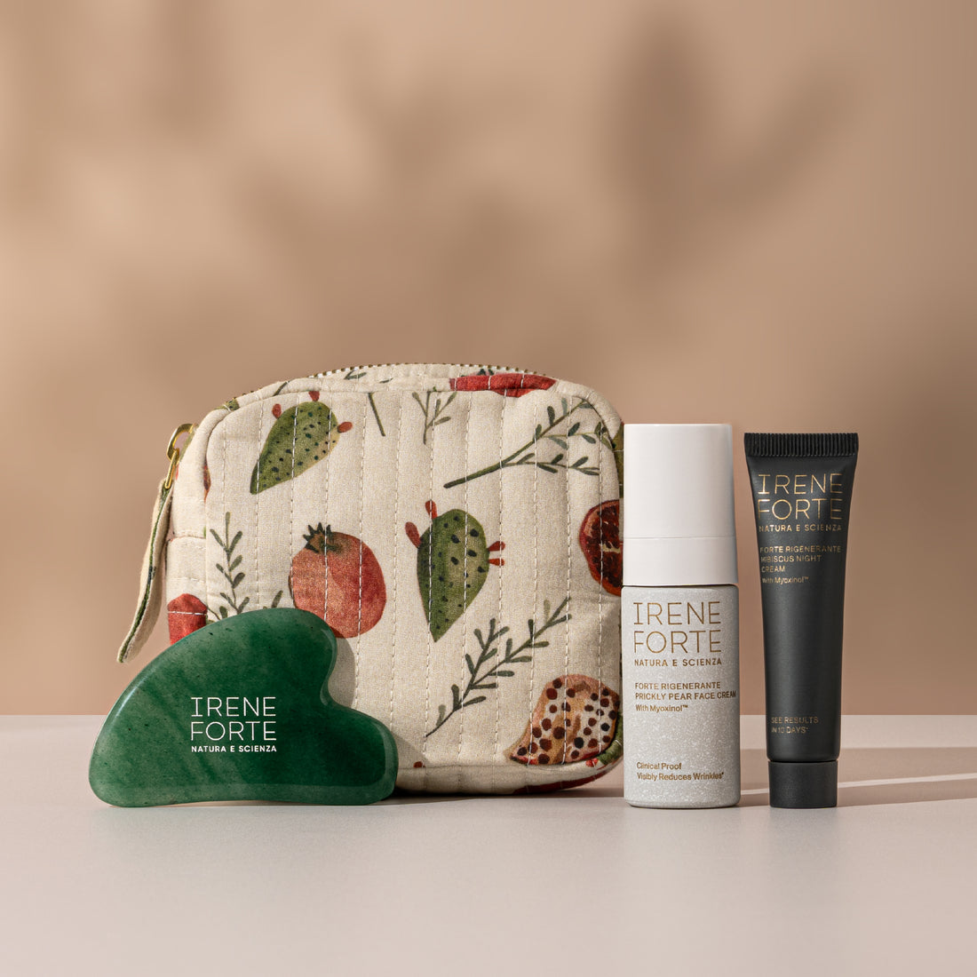 Irene Forte skincare product set with a floral-patterned pouch on a white background